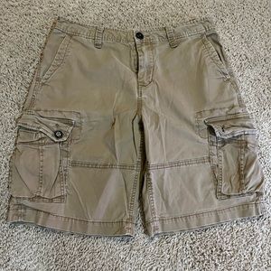 Beige cargo shorts .